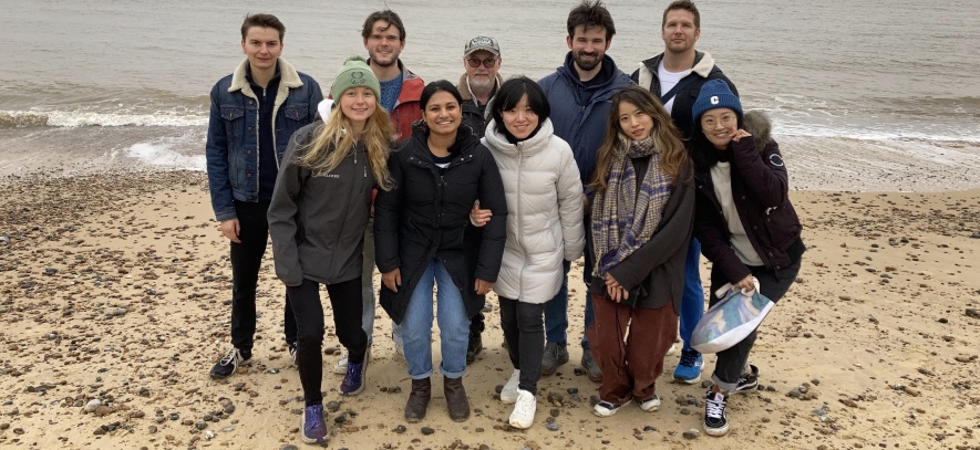 Members of ILM group on a beach.